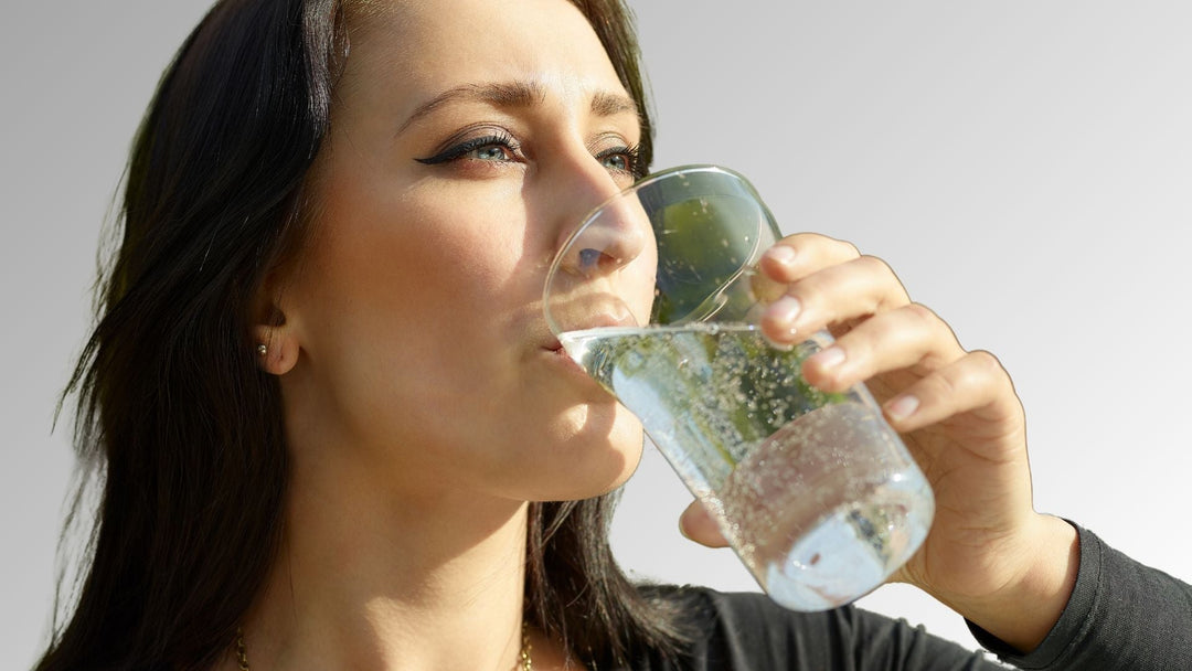 A Woman Drinking Sprite