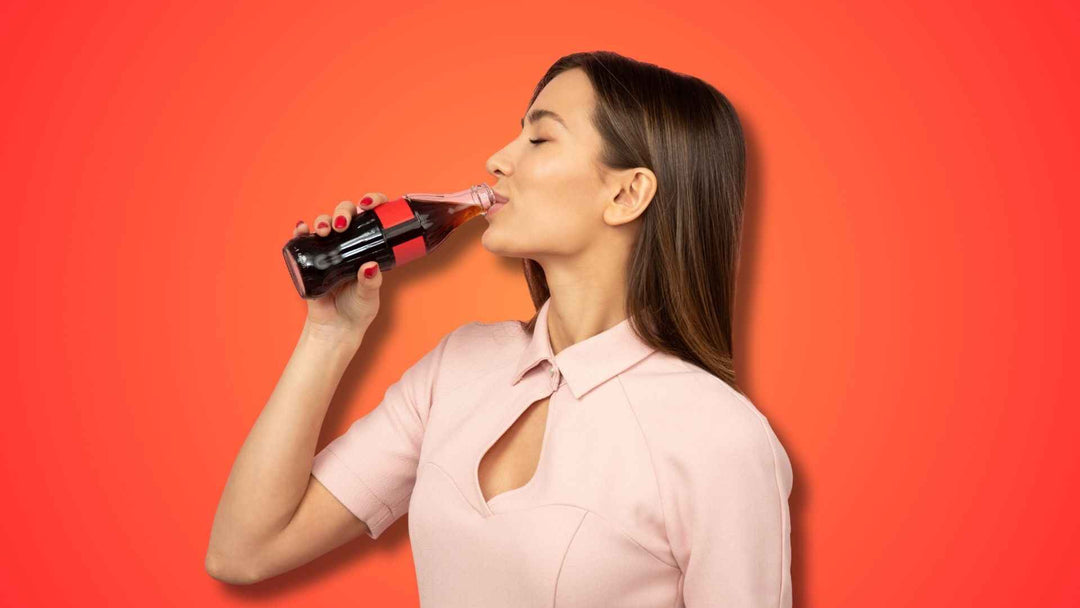 A woman drinking soda