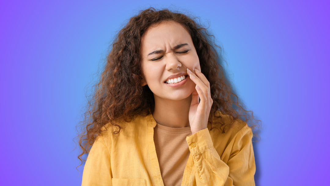 A person experiencing tooth discomfort