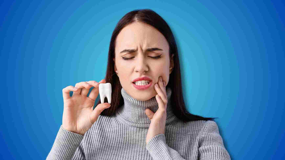 A woman experiencing tooth cavity