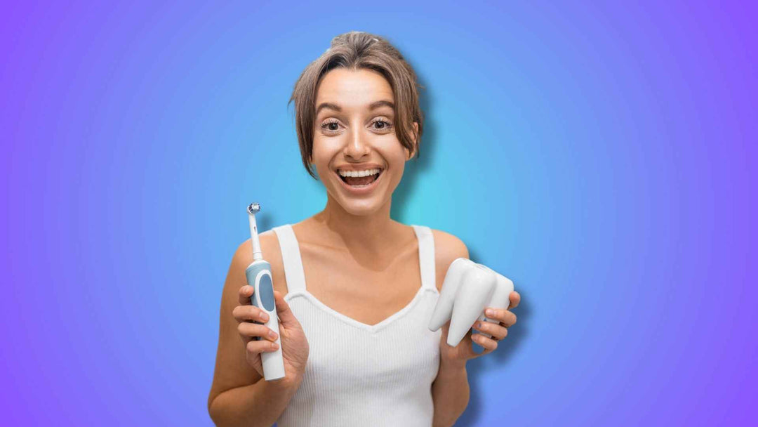 A woman showing toothbrushing and tooth model